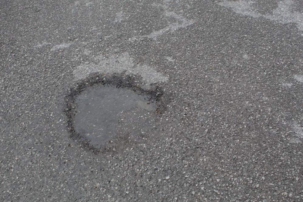 Top Reasons for Asphalt Potholes