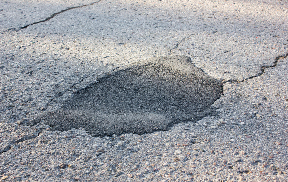 How to Stop Potholes From Ruining Your Driveway