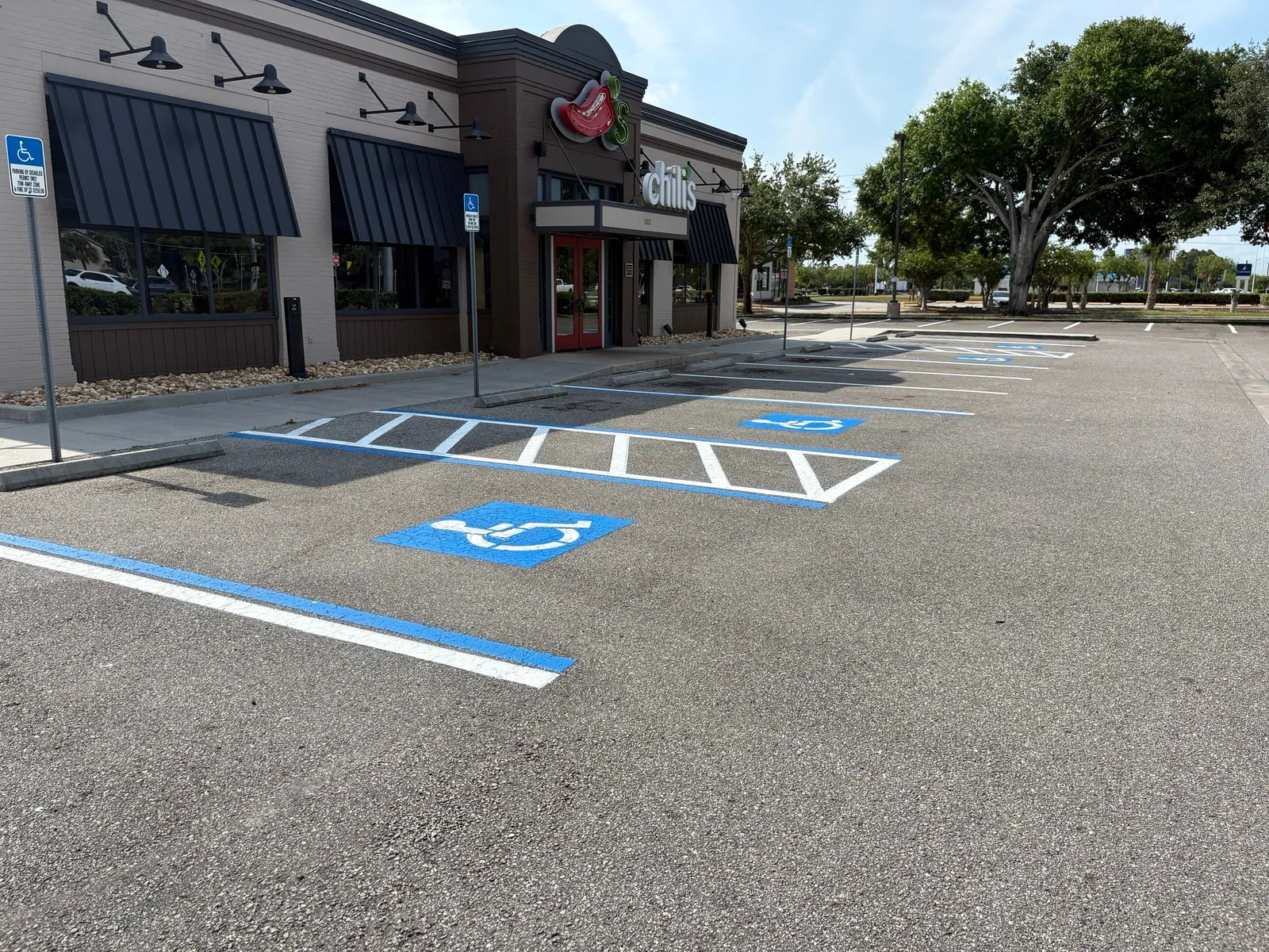 Chili's on Williamson Boulevard parking lot with ADA-compliant striping in Ormond Beach FL