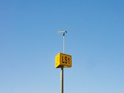 Metal sign post with mounted parking lot signage